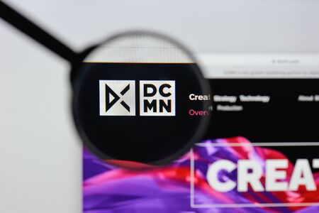 Milan, Italy - August 20, 2018: DCMN website homepage. DCMN logo visible.のeditorial素材