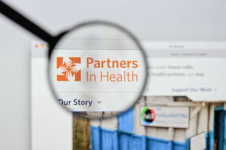 Milan, Italy - August 20, 2018: Partners in Health website homepage. Partners in Health logo visible.のeditorial素材