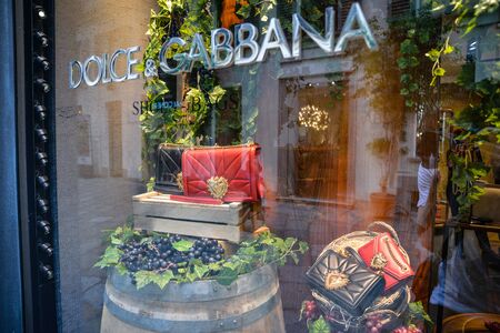 Milan, Italy - September 21, 2018: Dolce Gabbana store in Milan. Montenapoleone area. Fashion week Dolce Gabbana shopping.のeditorial素材