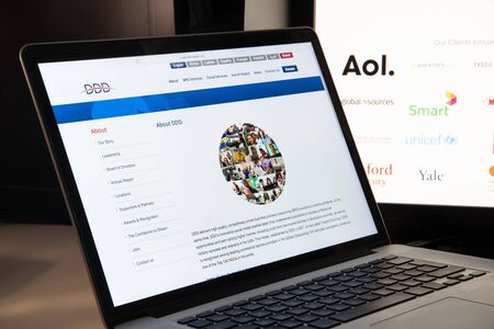 Milan, Italy - August 15, 2018: Digital Divide Data NGO website homepage. Digital Divide Data logo visible.のeditorial素材
