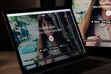 Milan, Italy - August 15, 2018: happn website homepage. happn logo visible.のeditorial素材