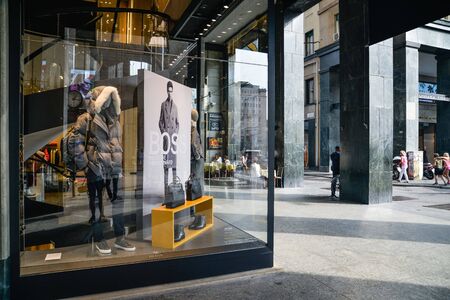 Milan, Italy - September 21, 2018: Hugo Boss store in Milan. Montenapoleone area. Fashion week Hugo Boss shopping.のeditorial素材