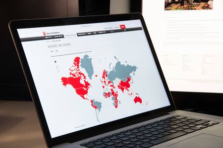 Milan, Italy - August 15, 2018: Save the Children International NGO website homepage. Save the Children International logo visible.のeditorial素材