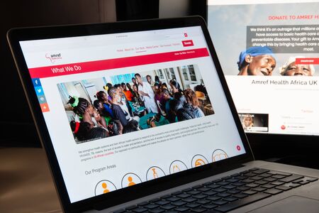Milan, Italy - August 15, 2018: AMREF NGO website homepage. AMREF logo visible.のeditorial素材