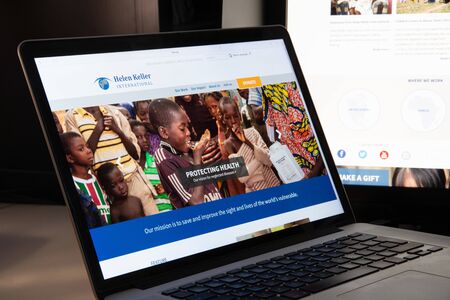 Milan, Italy - August 15, 2018: Helen Keller International NGO website homepage. Helen Keller International logo visible.のeditorial素材
