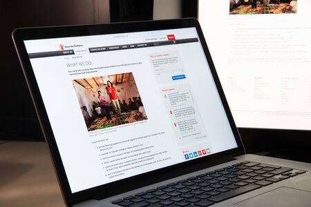 Milan, Italy - August 15, 2018: Save the Children International NGO website homepage. Save the Children International logo visible.のeditorial素材