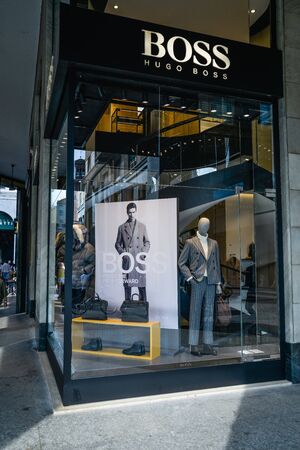 Milan, Italy - September 21, 2018: Hugo Boss store in Milan. Montenapoleone area. Fashion week Hugo Boss shopping.のeditorial素材