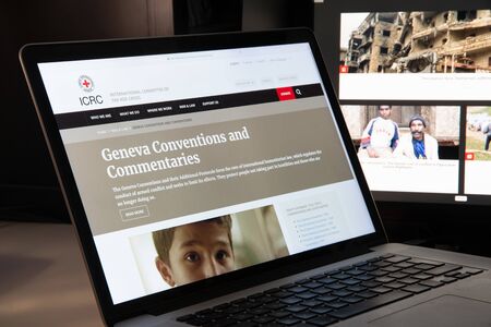 Milan, Italy - August 15, 2018: ICRC red cross NGO website homepage. ICRC red cross logo visible.のeditorial素材