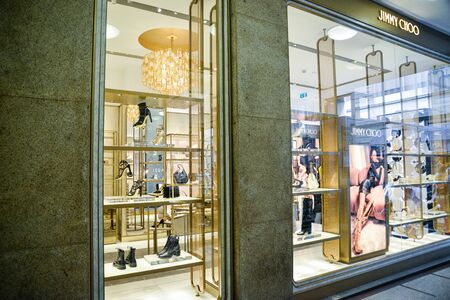 Milan, Italy - September 21, 2018: Jimmy Choo store in Milan. Montenapoleone area. Fashion week Jimmy Choo shopping.のeditorial素材
