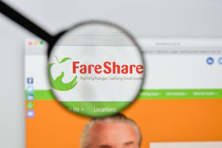 Milan, Italy - August 20, 2018: Fare Share website homepage. Fare Share logo visible.のeditorial素材