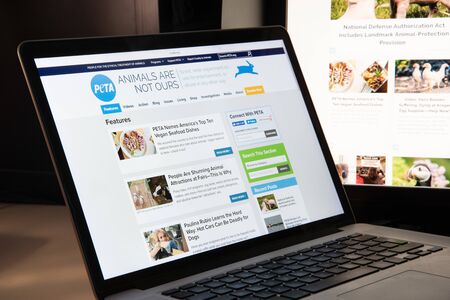 Milan, Italy - August 15, 2018: Peta NGO website homepage. Peta logo visible.のeditorial素材