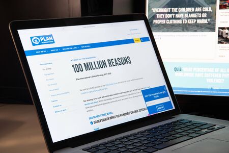 Milan, Italy - August 15, 2018: PLAN International NGO website homepage. PLAN International logo visible.のeditorial素材