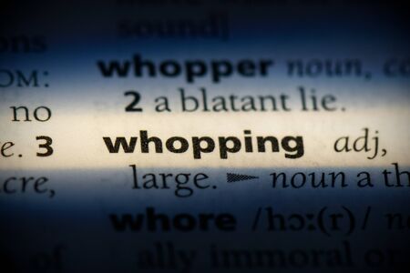 whopping word in a dictionary. whopping concept, definition.の写真素材