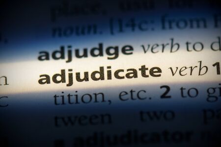adjudicate word in a dictionary. adjudicate concept, definition.の写真素材