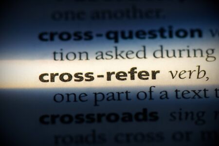 cross-refer word in a dictionary. cross-refer concept, definition.の写真素材
