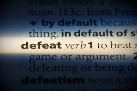 defeat word in a dictionary. defeat concept, definition.の写真素材
