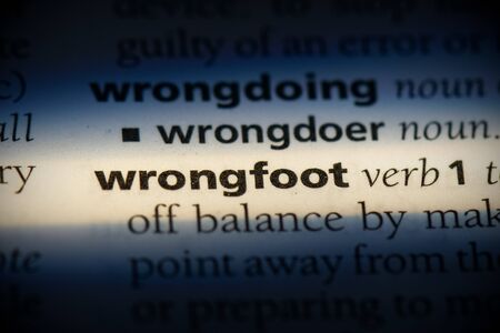wrongfoot word in a dictionary. wrongfoot concept, definition.の写真素材