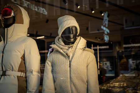 Milan, Italy - 2026, 3 Feb: Sease FW25 window display features luxury knitwear and outerwear in neutral tones, highlighting modern winter fashion trendsのeditorial素材