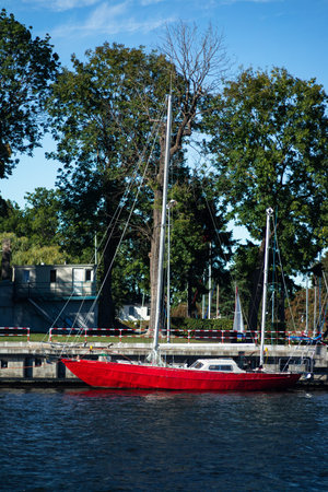 Old red sailboat at the wharfの写真素材