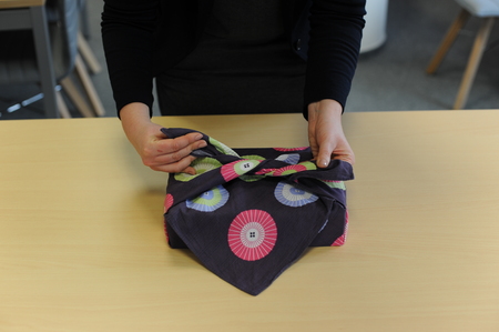 Furoshiki traditional Japanese ecological gift wrapping cloth and technique demonstrationの写真素材