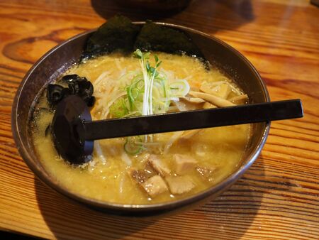Traditional delicious ramen soup cooked with miso paste in Japanの写真素材