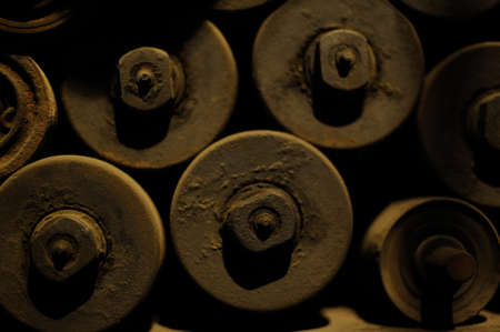 Old steel and iron heavy industrial metal parts and gear in an old factory or workshop for vintage technology used in metallurgy and metalworking and machine productionの写真素材