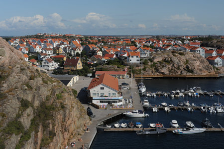 Scenic panorama of Kungshamn waterfront (SotenÃ¤s, VÃ¤stra GÃ¶taland, Sweden) with boats,...