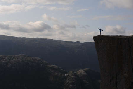 Preikestolen pulpit rock made of granite above Lysefjord fjord and canyon in Norway in Scandinavia in summerの写真素材