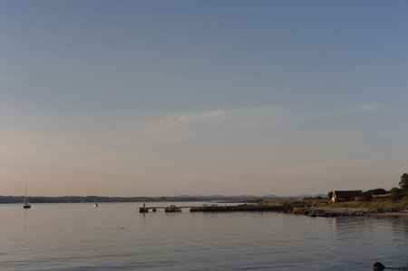 Pier or deck at Jomfruland island in Norway on a calm evening in summer