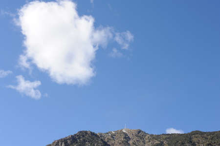 Blue sky with white clouds over mountain range on a sunny day in Andorra, Europeの写真素材