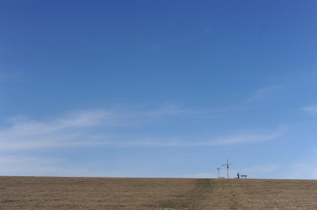 Blue sky horizon with a cross in Beskidy mountains in the south of Poland, Europe