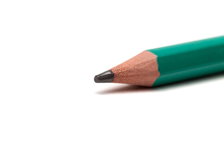 Green pencil on a white backgroundの写真素材