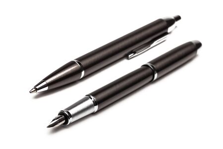 Pen and pen on a white backgroundの写真素材