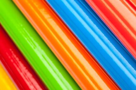 Colored ring binders on a white backgroundの写真素材