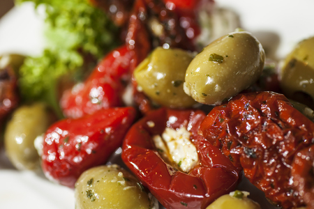 Olive salad, dried tomatoes and grilled peppersの写真素材