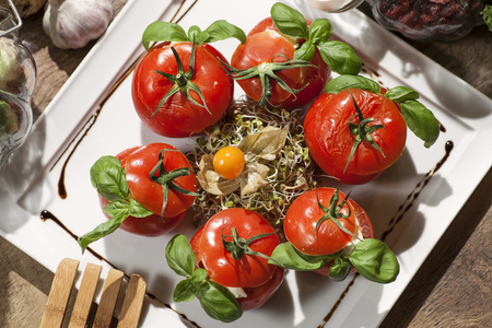 Grilled stuffed tomatoesの写真素材