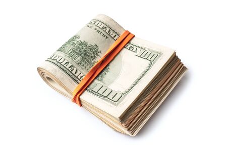 Dollar banknotes rolled into a roll on a white backgroundの写真素材