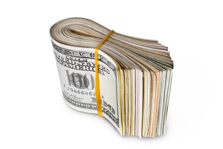 Dollar banknotes rolled into a roll on a white backgroundの写真素材