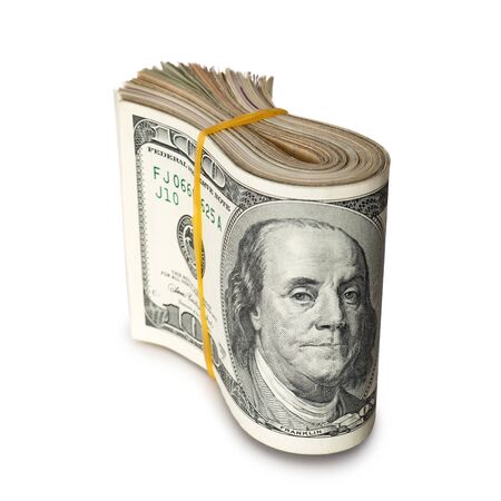 Dollar banknotes rolled into a roll on a white backgroundの写真素材
