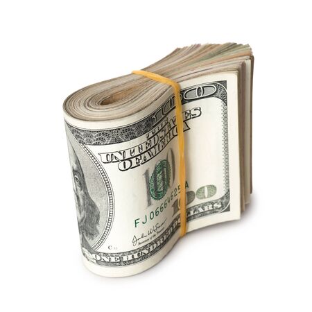 Dollar banknotes rolled into a roll on a white backgroundの写真素材