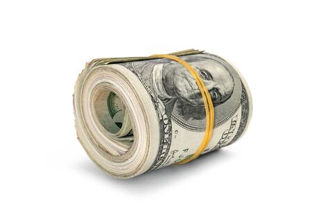 Dollar banknotes rolled into a roll on a white backgroundの写真素材