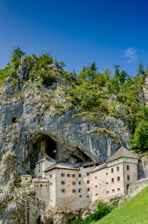 Postojna, Notranjska, Slovenia - August 22, 2017: Predjama castle nearby Postojna.のeditorial素材