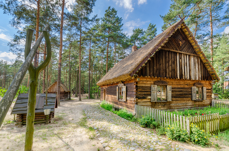 Kadzidlo, Mazovia province, Poland - July 12, 2015: Traditional house from Kurpie, ethnic region in Poland, open-air museum in Kadzidlo.のeditorial素材