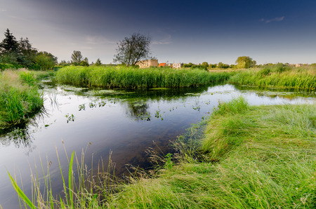 Wagrowiec (ger. Wongrowitz), Greater Poland province, Poland - July 7, 2017. Rivers Nielba and Welna bifurcation (intersection of two rivers, crossing each other without mixing their waters).のeditorial素材