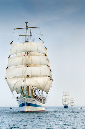 Gdynia, pomeranian province / Poland - September 4, 2011: Frigate Mir, iIn the background barquentine Thalassa, Frigate Dar Mlodziezy. Bay of Gdansk.のeditorial素材