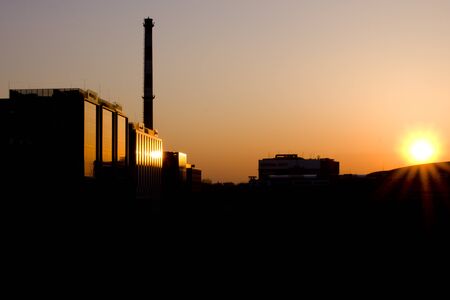 Factory and office center in Krakow in the sunset.の写真素材