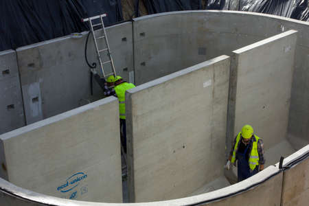 Construction of a concrete reservoir.