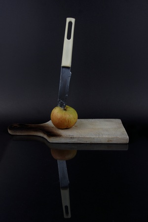 knife in appleの写真素材
