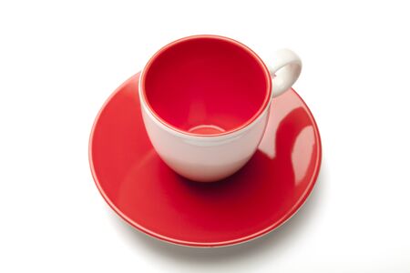 cup and saucer on white backgroundの写真素材