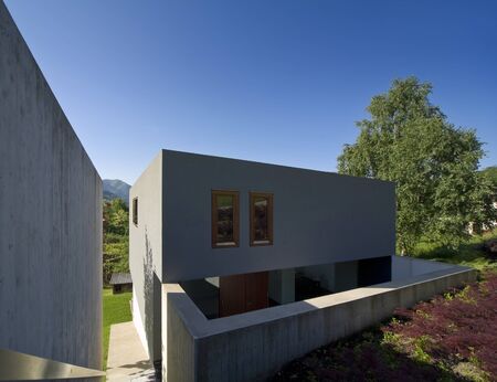 Modern house surrounded by nature, outdoorsの写真素材